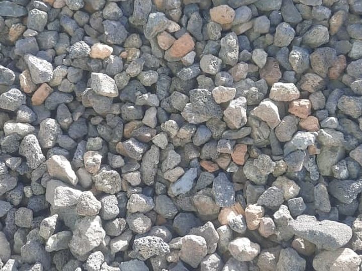 Natural pozzolana, grey and reddish volcanic stones